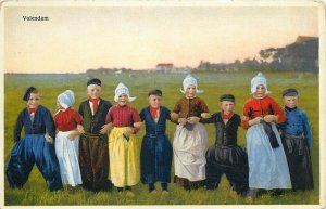 Netherlands dutch children types costumes Volendam early ethnography postcard