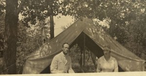 RPPC Postcard Couple Camping Sitting in Front of Tent & Trees