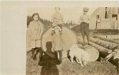 REAL PHOTO-CHILDREN & DOG STANDING ON LOGS-BARN-R93361