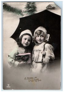 1913 Christmas Cute Girls With Present Claremont SD RPPC Photo Antique Postcard