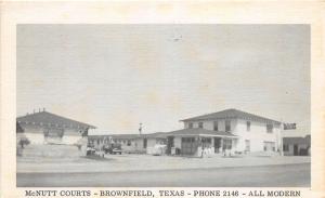 F14/ Brownfield Texas Postcard 1954 McNutts Courts Roadside