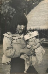 Asian native people mother holds her newborn real photo postcard