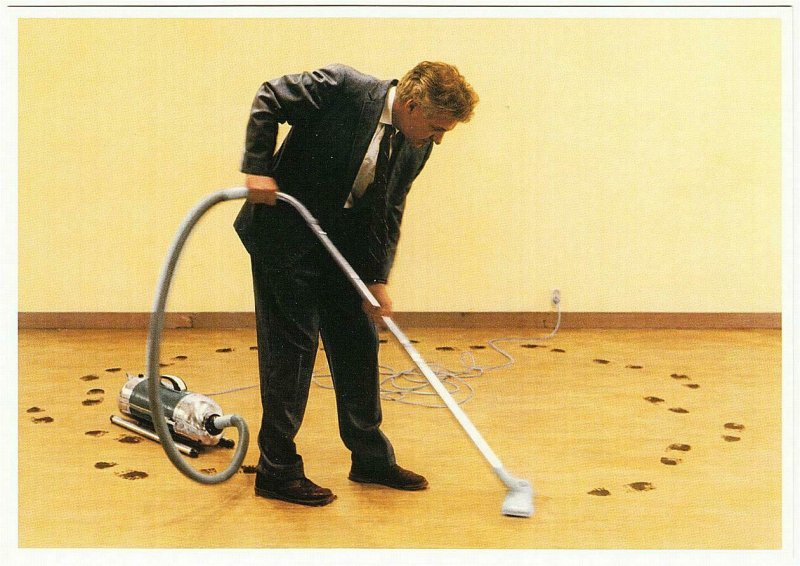 Man with Vacuum Cleaner on His Own Muddy Tracks by Teun Hocks Art Postcard