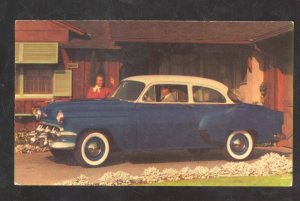 1954 CHEVROLET ONE FIFTY UTILITY SEDAN CAR DEALER ADVERTISING POSTCARD CHEVY