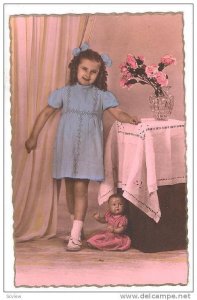 RP; Hand-tinted, Happy girl in blue dress, doll at her feet, 00-10s