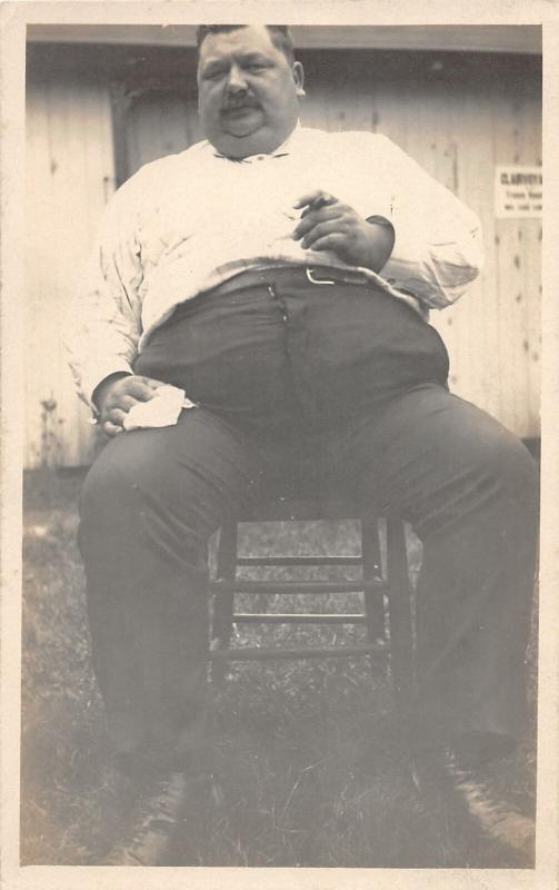 F37/ Interesting Real Photo RPPC Postcard c1910 Fat Man Smoking Cigar Chair