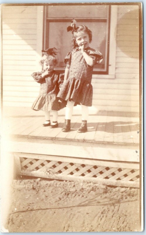 c1910s Colorado Cute Little Girls RPPC House Kids Finger Mouth Real Photo A147