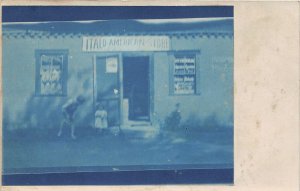 H32/ Greeley Colorado RPPC Postcard American Store Front Kids Blue Tint