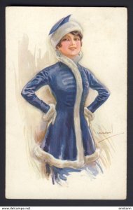 USABAL a/s Beautiful woman in winter wear with fur trimmed hat blue jacket.