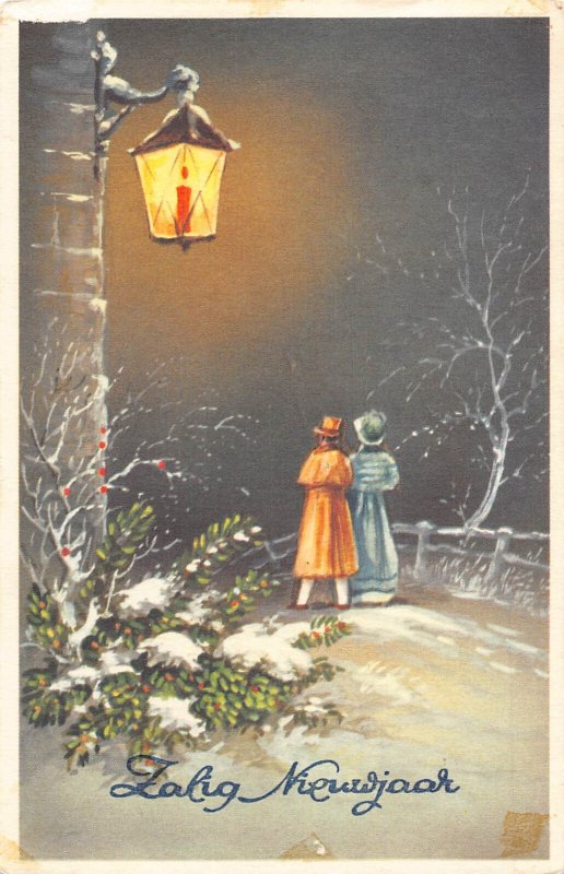 A219 New Year Greetings 1961 Couple Candle Lamp Night Snow vintage postcard