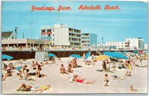 Greetings from Rehoboth Beach - Atlantic Sands Motel woman half-buried in sand 