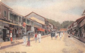 STREET SCENE KANDY CEYLON TO USA PRECANCEL POSTAGE DUE STAMP POSTCARD (c.1910)