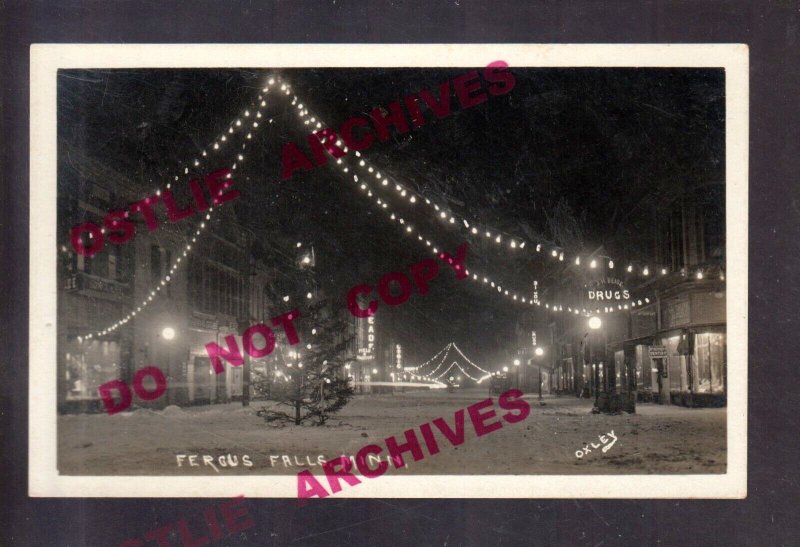 Fergus Falls MINNESOTA RPPC c1910 CHRISTMAS LIGHTS Electric MAIN STREET Night MN