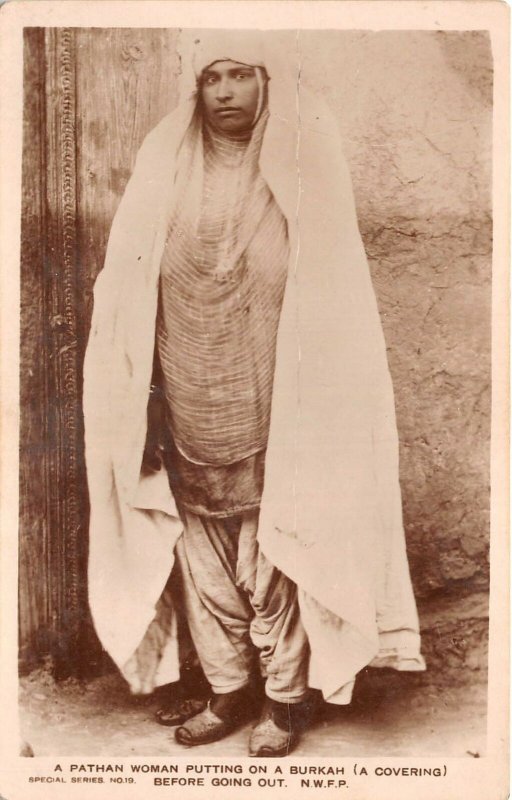 Lot141 real photo a pathan woman putting on a burkah nwfp Pakistan types