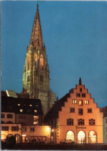 Postcard Germany Freiburg -  Minster and Kornhaus at night