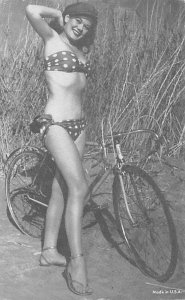 Woman in Bikini Posing with Bicycle Woman in Bikini Posing with Bicycle