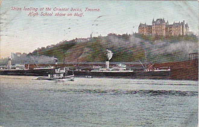 Washington Tacoma Ships Loading At Oriental Docks With High School Above On B...