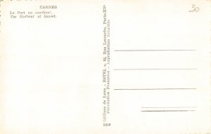C057  France Cannes The Harbour at Sunset  vintage postcard
