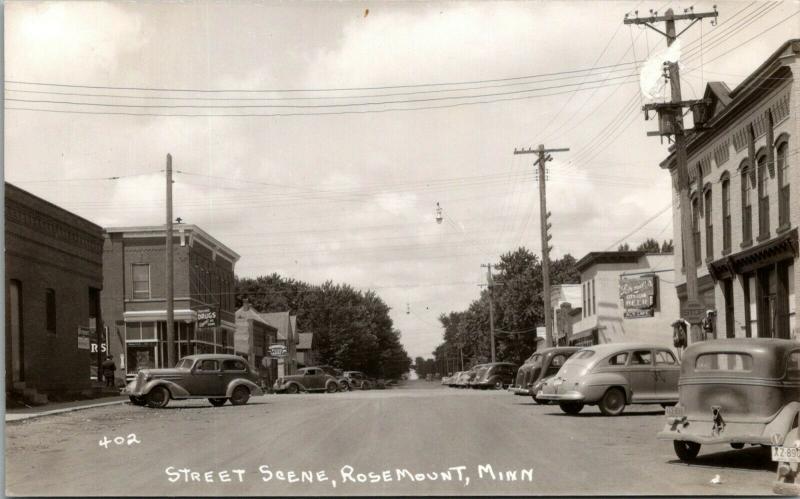 Rosemount MN~Glenmore Whisky~Schmidt's Beer~Al's Cafe~Yellow Stop Sign~1939 RPPC 