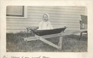 c1910 RPPC Postcard Baby in a Vulcan Wheel Barrow Unknown US Location Unposted