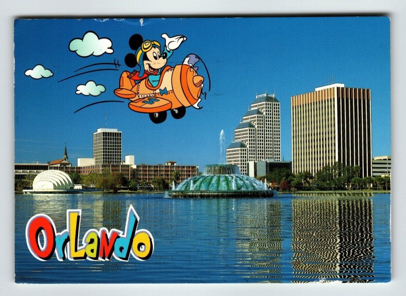 Orlando Florida Postcard Mickey Mouse In Airplane View Of Lake Eola 2002