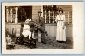 c1910's Family Child Girl Riding Rocking Horse Toy Doll RPPC Photo Postcard