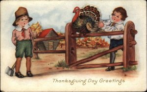 Whitney Thanksgiving Boy with Axe Prepares to Kill Turkey c1910 Postcard