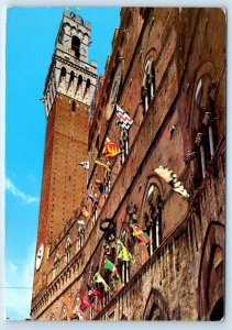 Palazzo Pubblico con bandiere delle 17 Contrade SIENNA ITALY Postcard