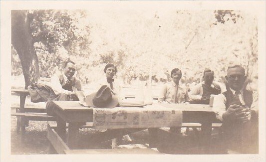 People Posing At Picnic Table Real Photo