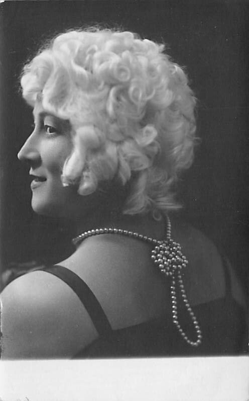 Black and White picture of a woman with white hair Glamour Woman Writing on B...