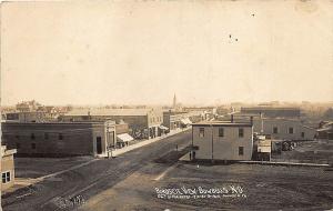 Bowbells ND Birdseye View Dirt Street Storefronts RPPC Postcard