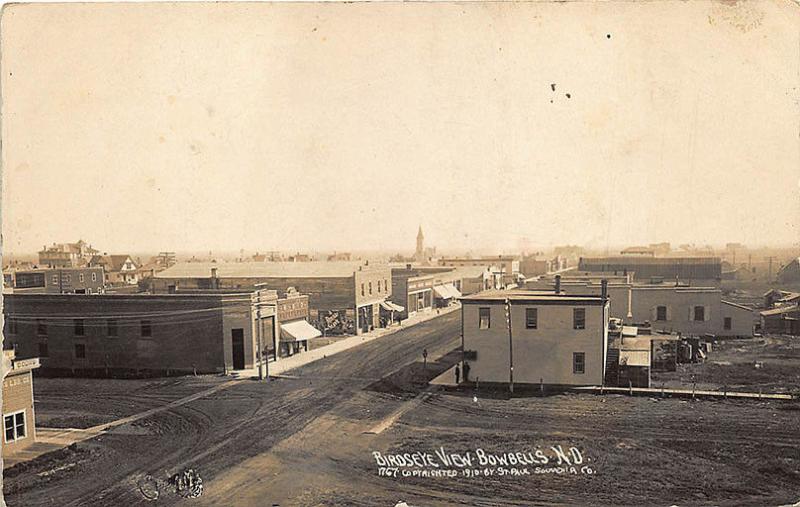 Bowbells ND Birdseye View Dirt Street Storefronts RPPC Postcard