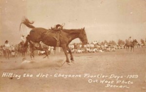 RPPC HITTING THE DIRT CHEYENNE WYOMING RODEO HORSE REAL PHOTO POSTCARD (1929)