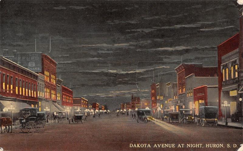 Huron South Dakota Avenue~Wheeler Glass~Dentist~Clothier~Night View c1914  