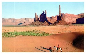 Monument Valley in Arizona and Utah w Person Riding Horse Postcard