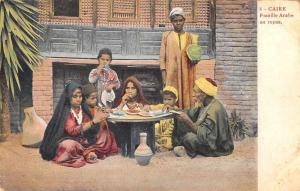 Cairo Egypt view of Arab family sharing meal antique pc Z23923