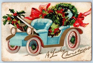 Christmas Postcard Car With Holly Berries Embossed Alcester South Dakota SD 1910