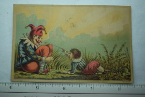 1870's Creepy Victorian Trade Card Giant Jester Puppet & Small Child F59