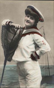 Woman in Sailor Suit & Net Cross Dressing Drag Tinted Real Photo c1910 Postcard