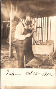 1912 Real Photo Postcard Man Making a Wooden Box in a Shop House Construction