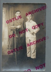 RPPC 1917 OCCUPATIONAL 2 Boys Holding HAMMER RULER CALIPER Studio Shot