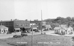 RPPC GAS STATION THE SQUARE NORTH ANSON MAINE REAL PHOTO POSTCARD (c. 1930s)