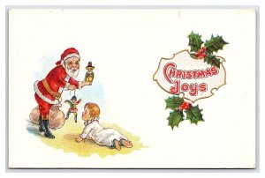 Christmas Joys Embossed Postcard Santa Claus Boy Sack Of Toys Holly