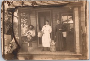 Family with Dog Stands on Porch with Buckets Portrait - Vintage Postcard