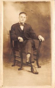 1920s RPPC Real Photo Postcard Studious Looking ManGlasses In Chair