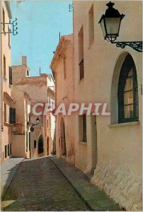 Postcard Modern Sitges (Costa Dorada) a peaceful white street