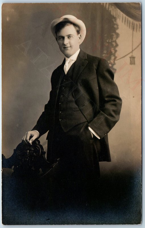 c1910s Cool Young Man Portrait RPPC Hat Fun Classy Smirk Carved Chair Photo A212