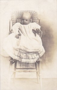 Young Child in High Chair early 1900s Real Photo