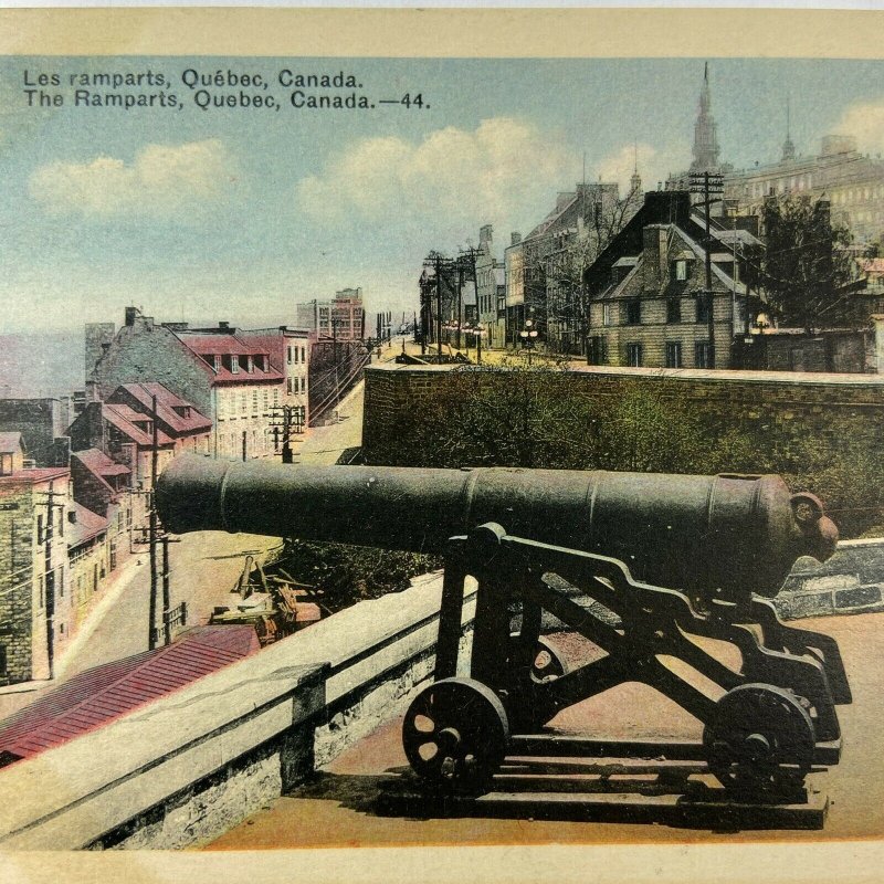 The Ramparts Quebec Canada Colored Canons Building Postcard Vintage