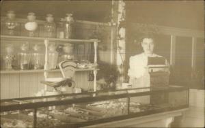 Candy Store Interior Woman Cash Register Candy Jars Scale Telephone c1910 RPPC